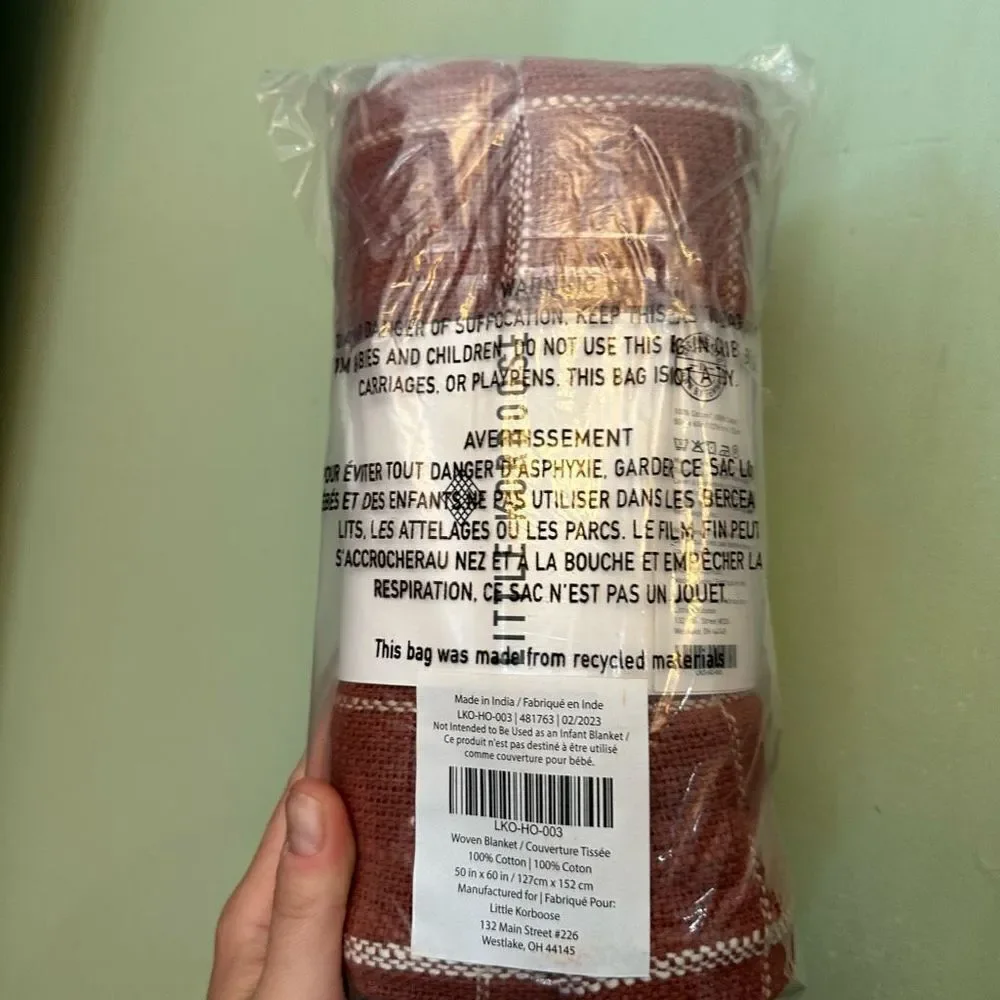 Little Korboose by April Nemeth rust woven throw blanket